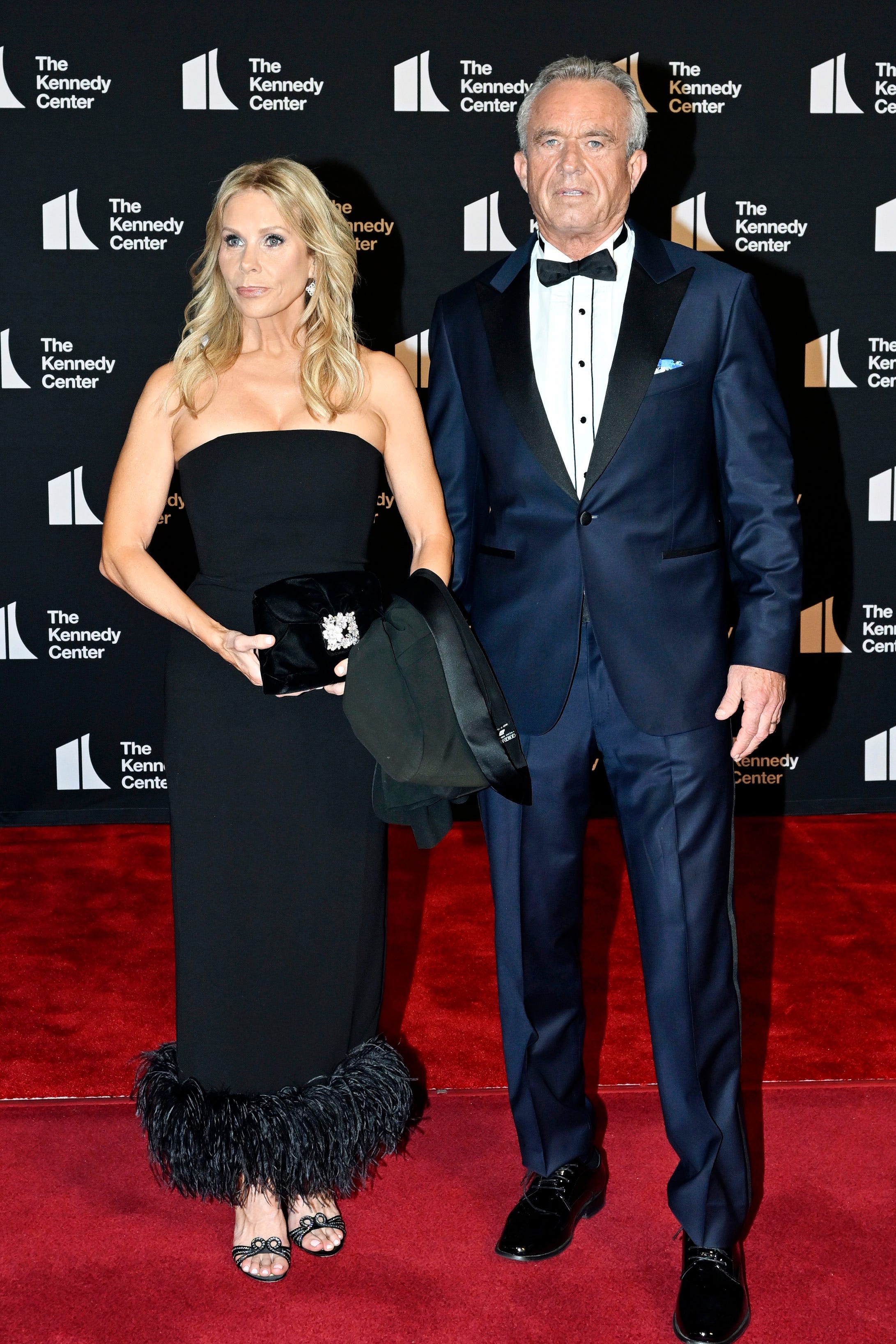 Cheryl Hines and Robert F. Kennedy Jr. walk the red carpet at the Kennedy Center.