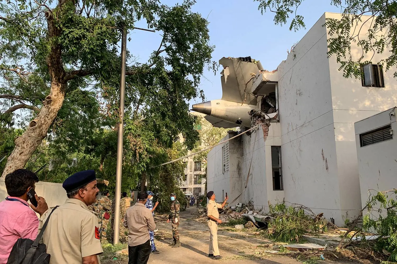 The back of Air India Flight 171 is pictured at the site after it crashed in a residential area near the airport in Ahmedabad, India, on June 12, killing at least 260 people.