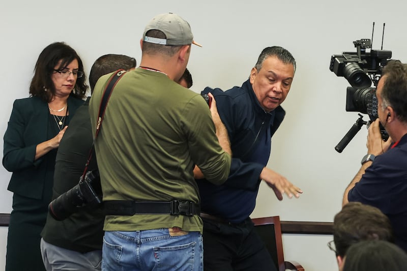 Democratic Senator Alex Padilla was forcibly removed from the room after interrupting a news conference with Department of Homeland Security Secretary Kristi Noem in Los Angeles on June 12, 2025. He was then forced to the ground and handcuffed by officers in the hallway.