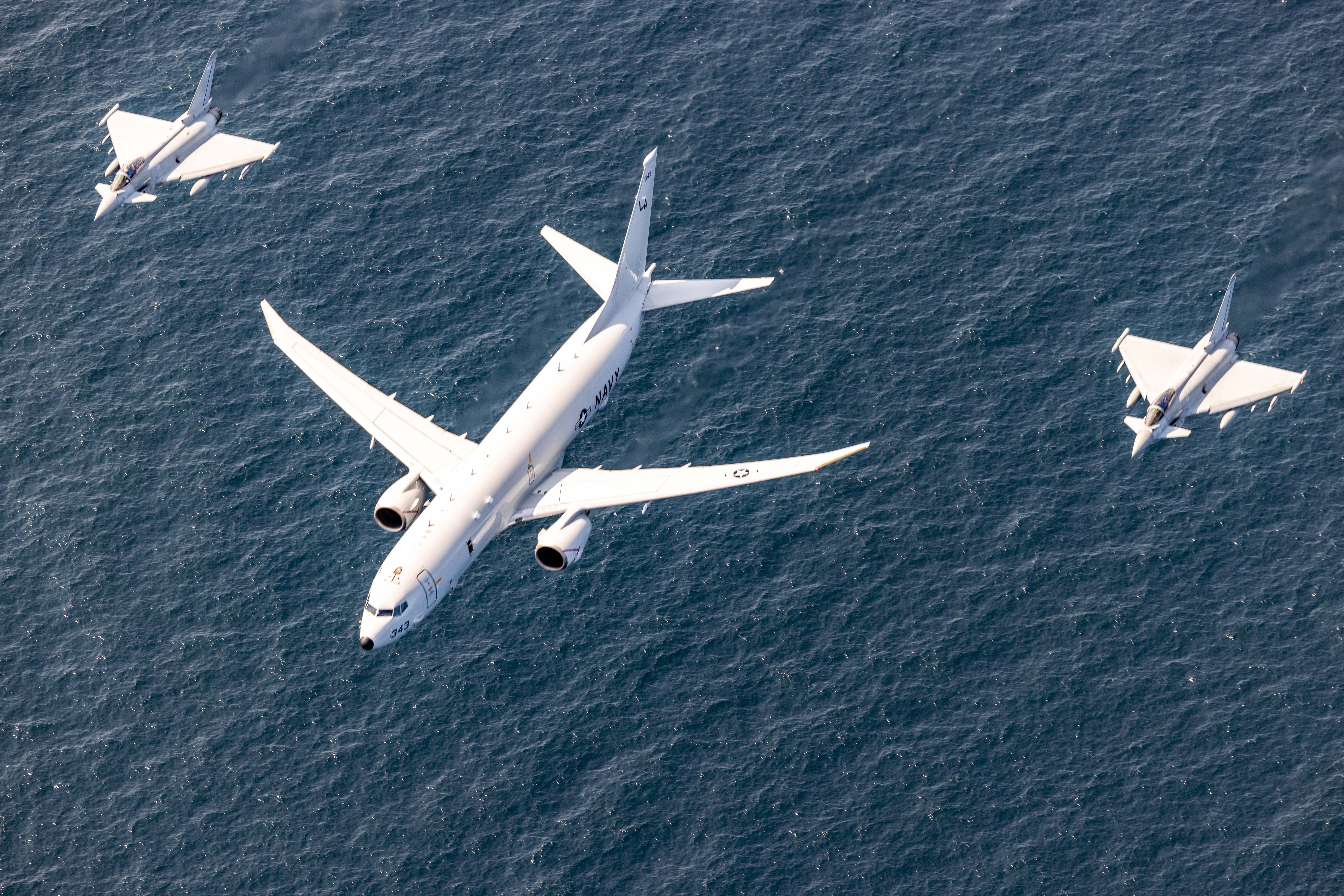A U.S. Navy P-8A Poseidon, center, and two NATO Allied JAS 39 Gripen fighter aircraft participate in an aerial formation during exercise Baltic Operations 2025 (BALTOPS 25) in the Baltic Sea, June 12, 2025.