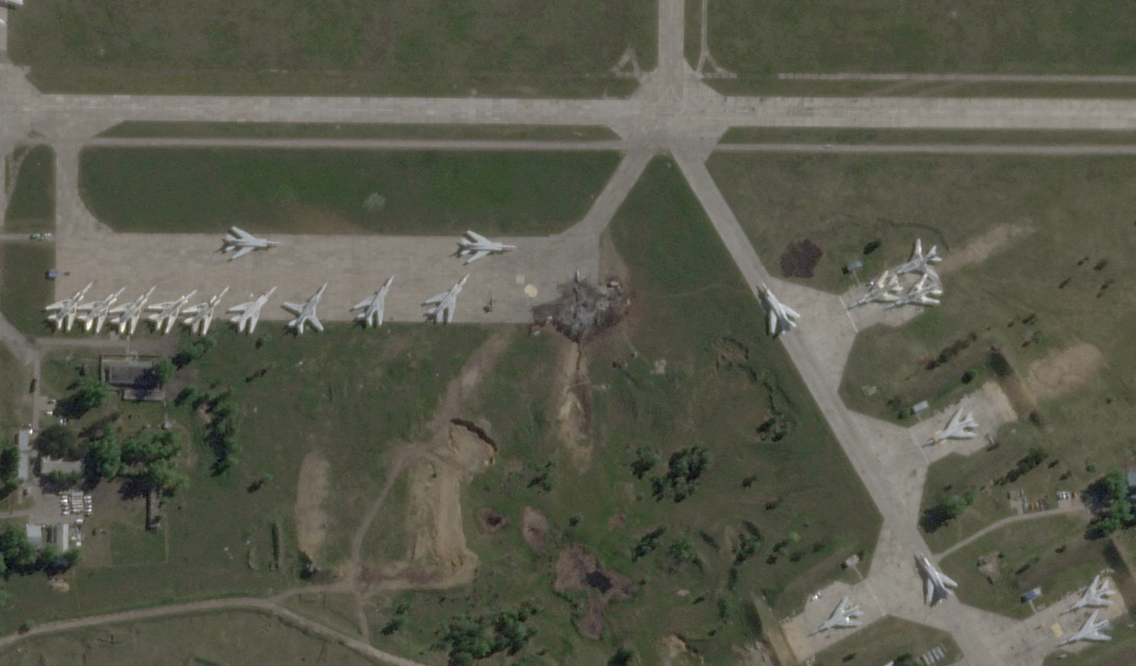 A satellite view shows military aircraft, some sitting destroyed, at the Belaya air base, near Stepnoy, Irkutsk region, Russia, June 4, 2025.