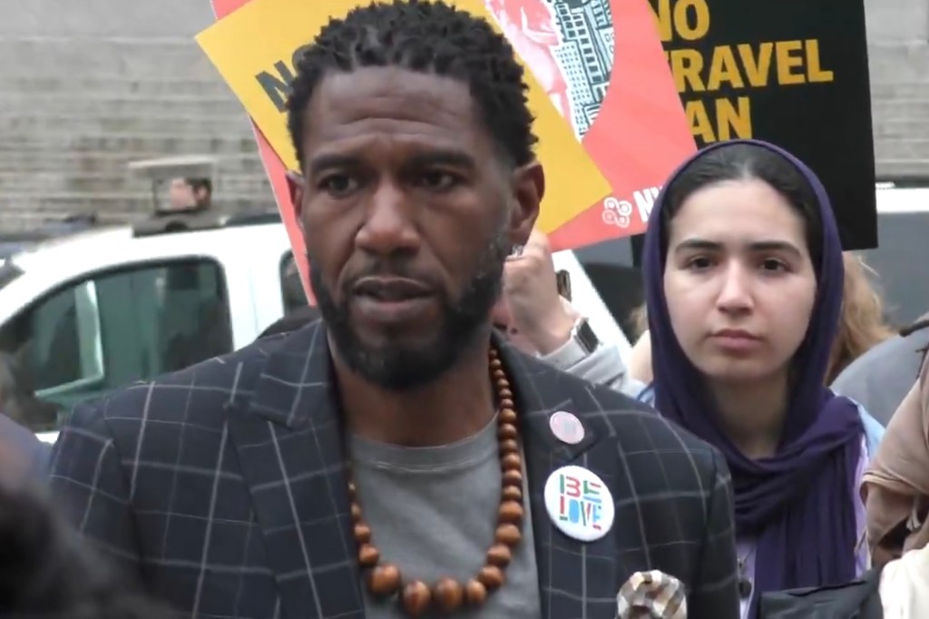 Jumaane Williams speaking at a NYC protest against Trump's travel ban.