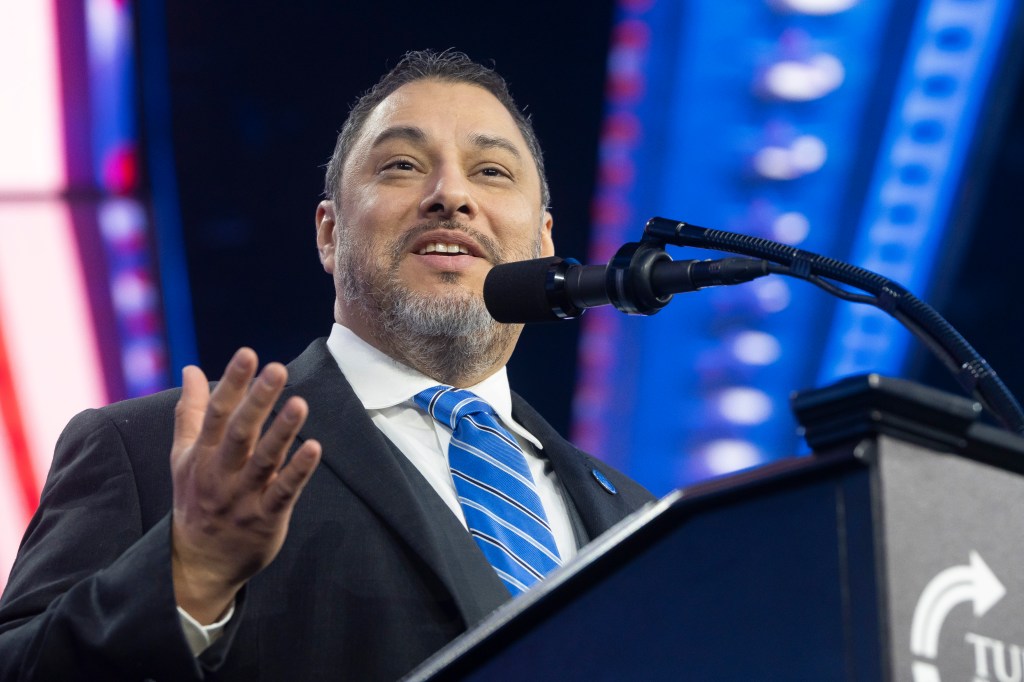 Paul Perez speaking at Turning Point USA's AmericaFest.