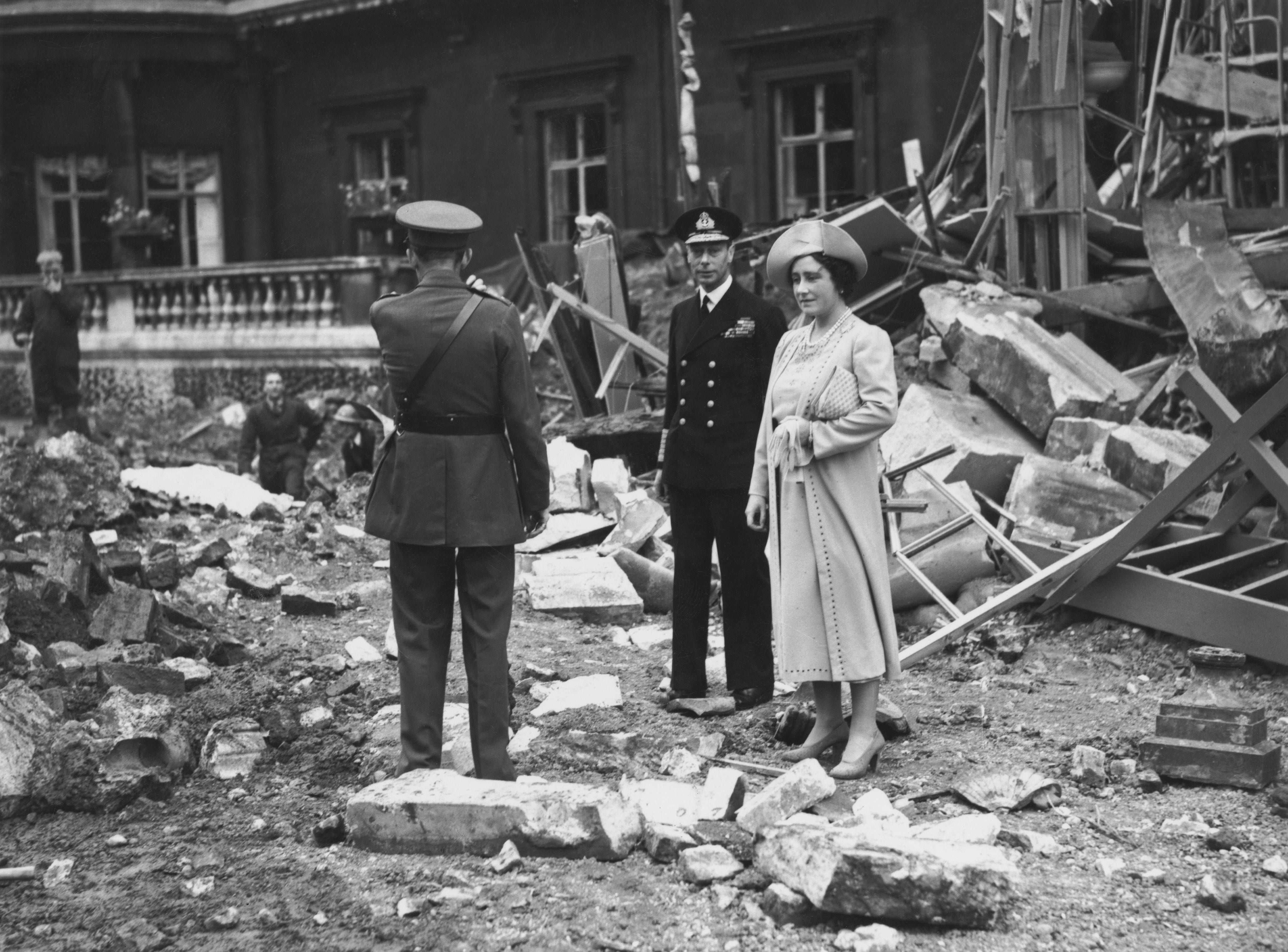 Queen Elizabeth (1900 - 2002) and King George VI (1895 - 1952) inspect the bomb damage at Buckingham Palace in London, after an air raid during the Blitz, 10th September 1940.