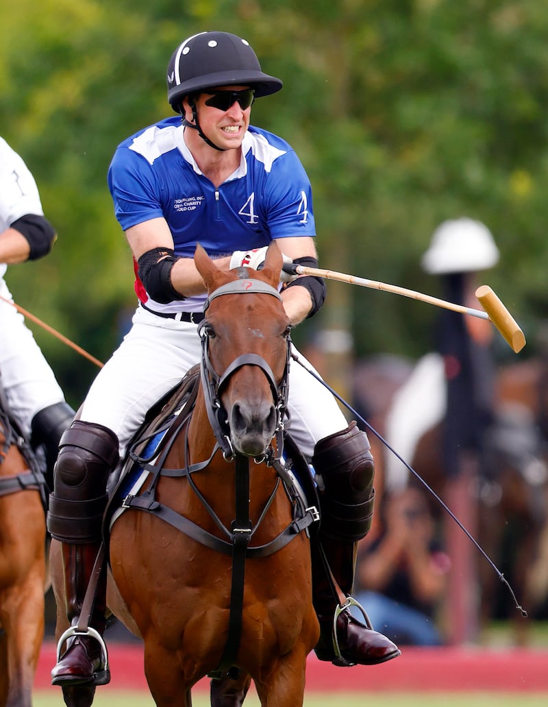 Prince William playing polo in Windsor in July 2024.