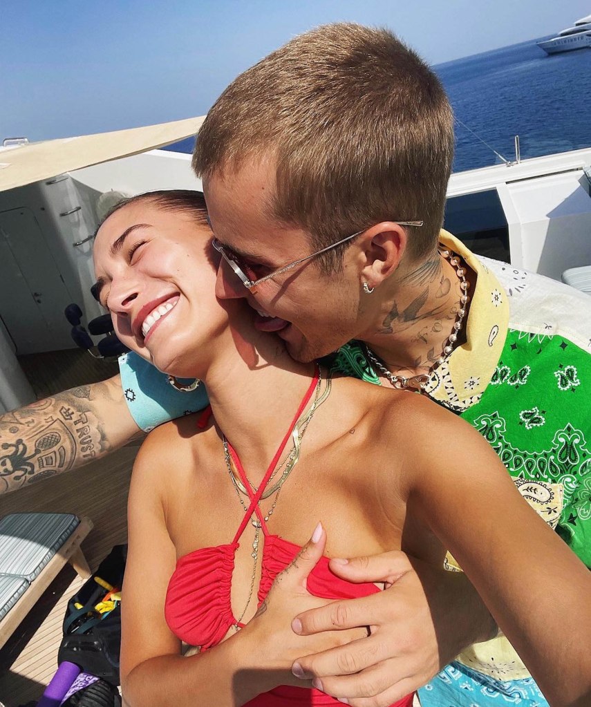 Justin Bieber and Hailey Bieber showing PDA. 