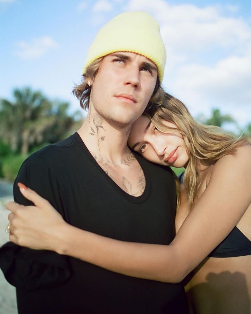 Justin Bieber and Hailey Bieber hugging. 
