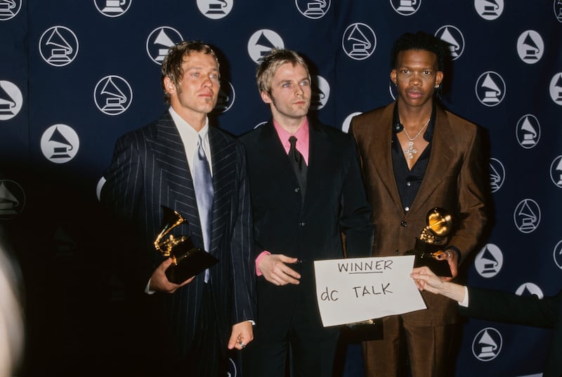 American Christian rap and rock band DC Talk at the 1997 Grammy Awards. The trio won the Best Rock Gospel Album award for their album 'Jesus Freak'.