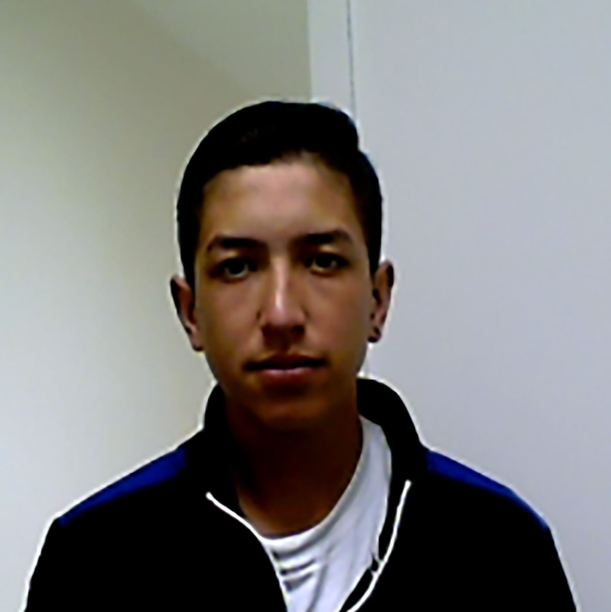 Mugshot of Joan Sebastian Castaneda-Lozada.