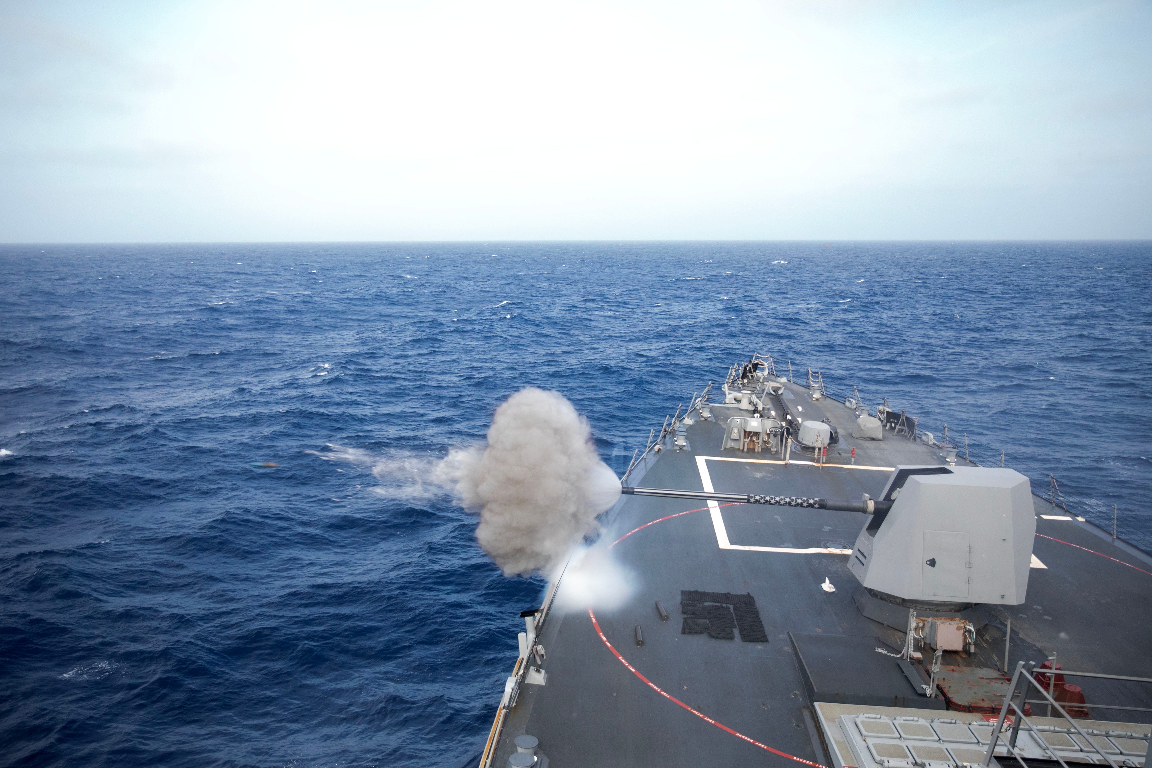 The Arleigh Burke-class guided-missile destroyer USS Wayne E. Meyer (DDG 108) fires an Mark 45 5-inch gun during a live-fire exercise in the U.S. Central Command area of responsibility.