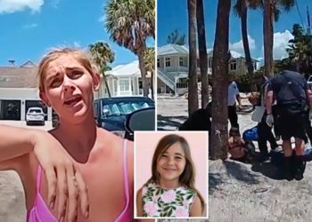 ‘Brave’ 9-year-old girl seen on bodycam footage moments after shark nearly bites off her hand: ‘Blood everywhere’
