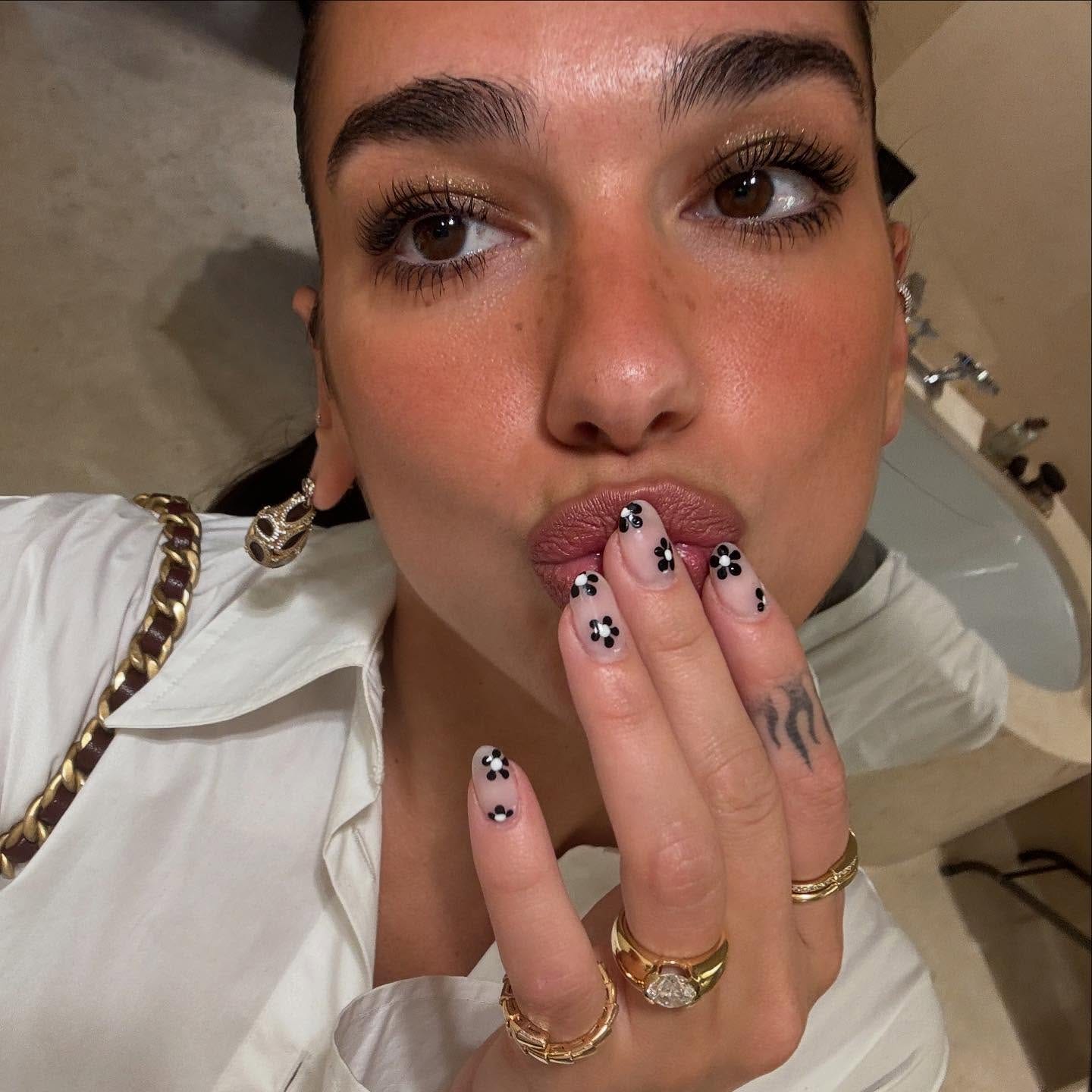 Dua Lipa engagement ring selfie instagram