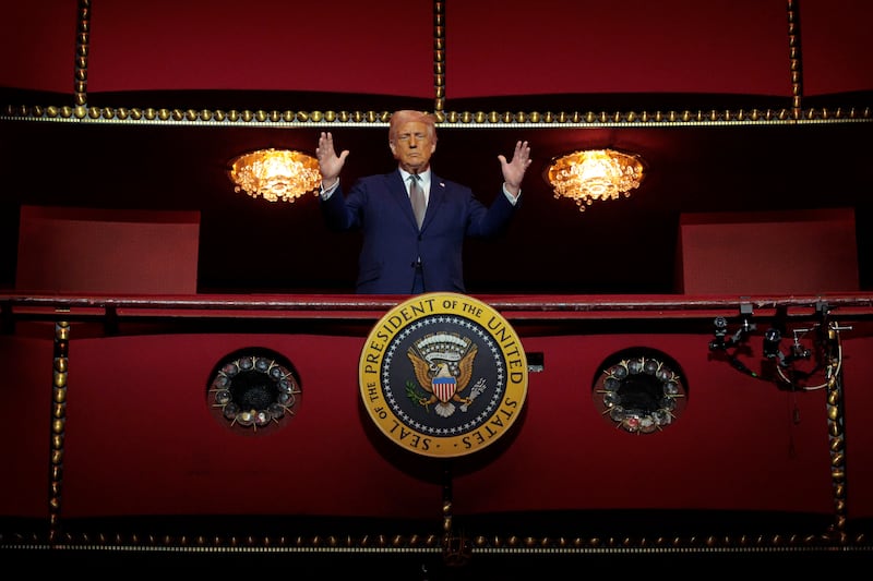 President Donald Trump looks down from the Presidential Box in the Opera House at the John F. Kennedy Center for the Performing Arts