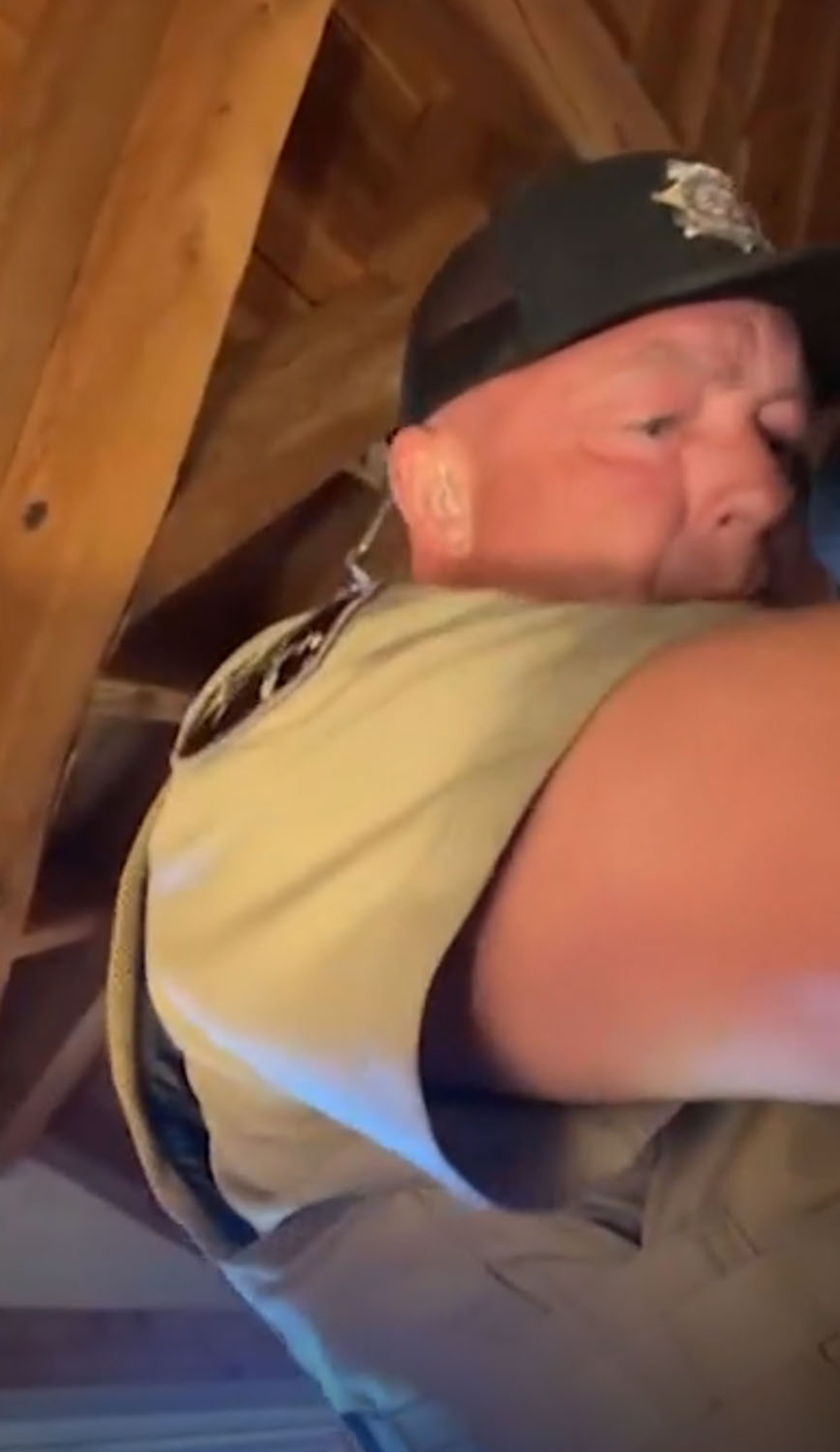 A police officer in a screenshot from a video. 