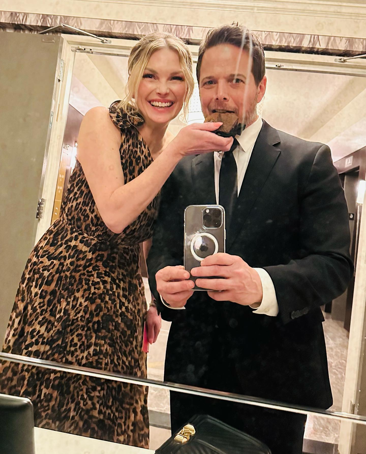 Scott and Kelley Wolf in a mirror selfie. 