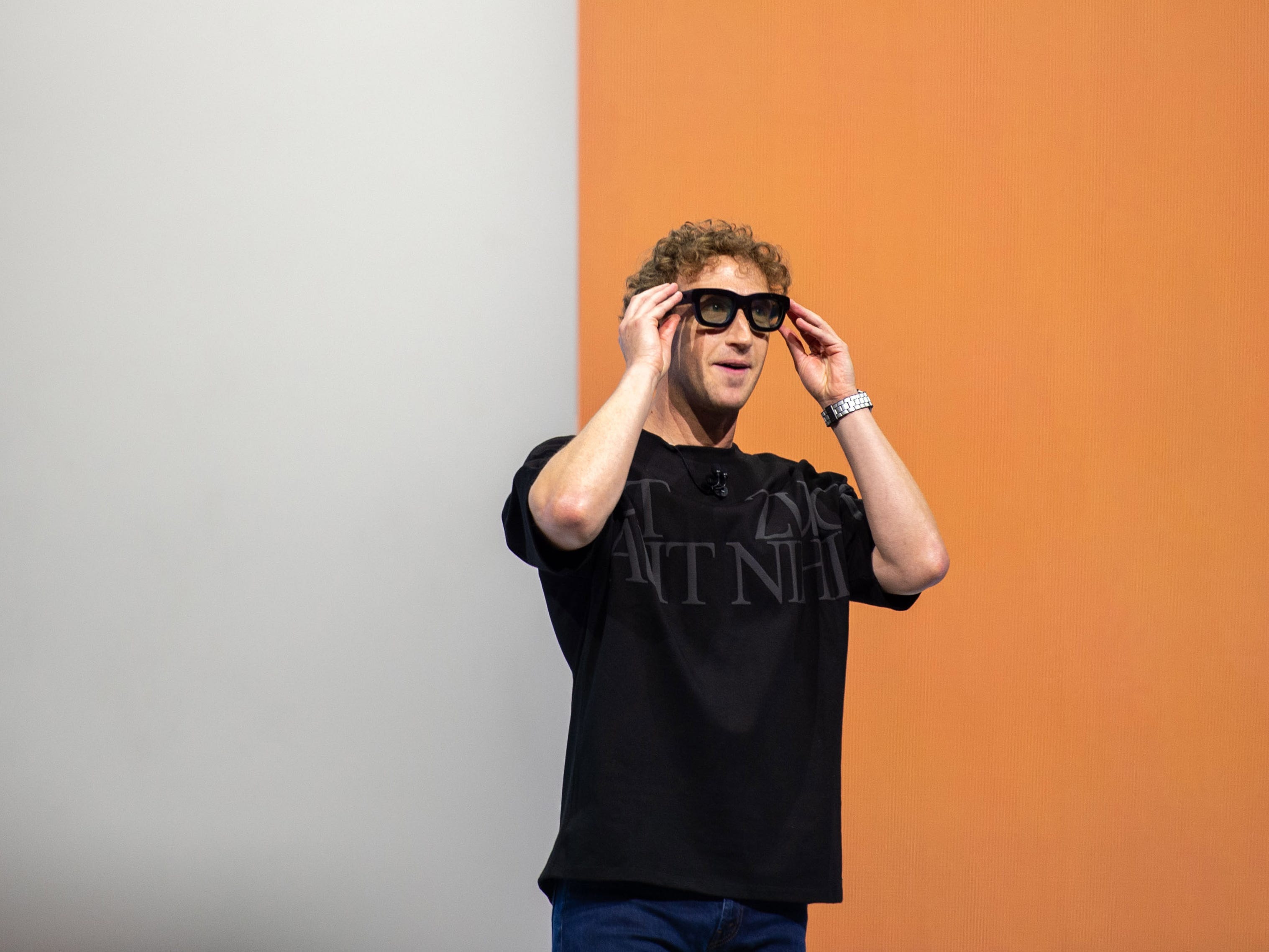 A photo of Mark Zuckerberg demoing Meta's Orion augmented-reality smart glasses at Meta Connect 2024.