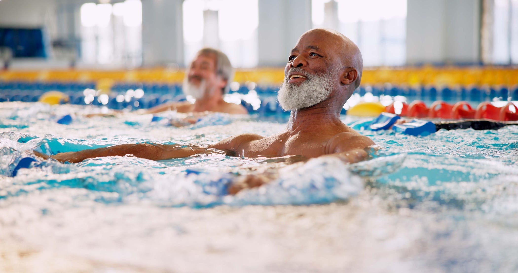 man doing water aerobics