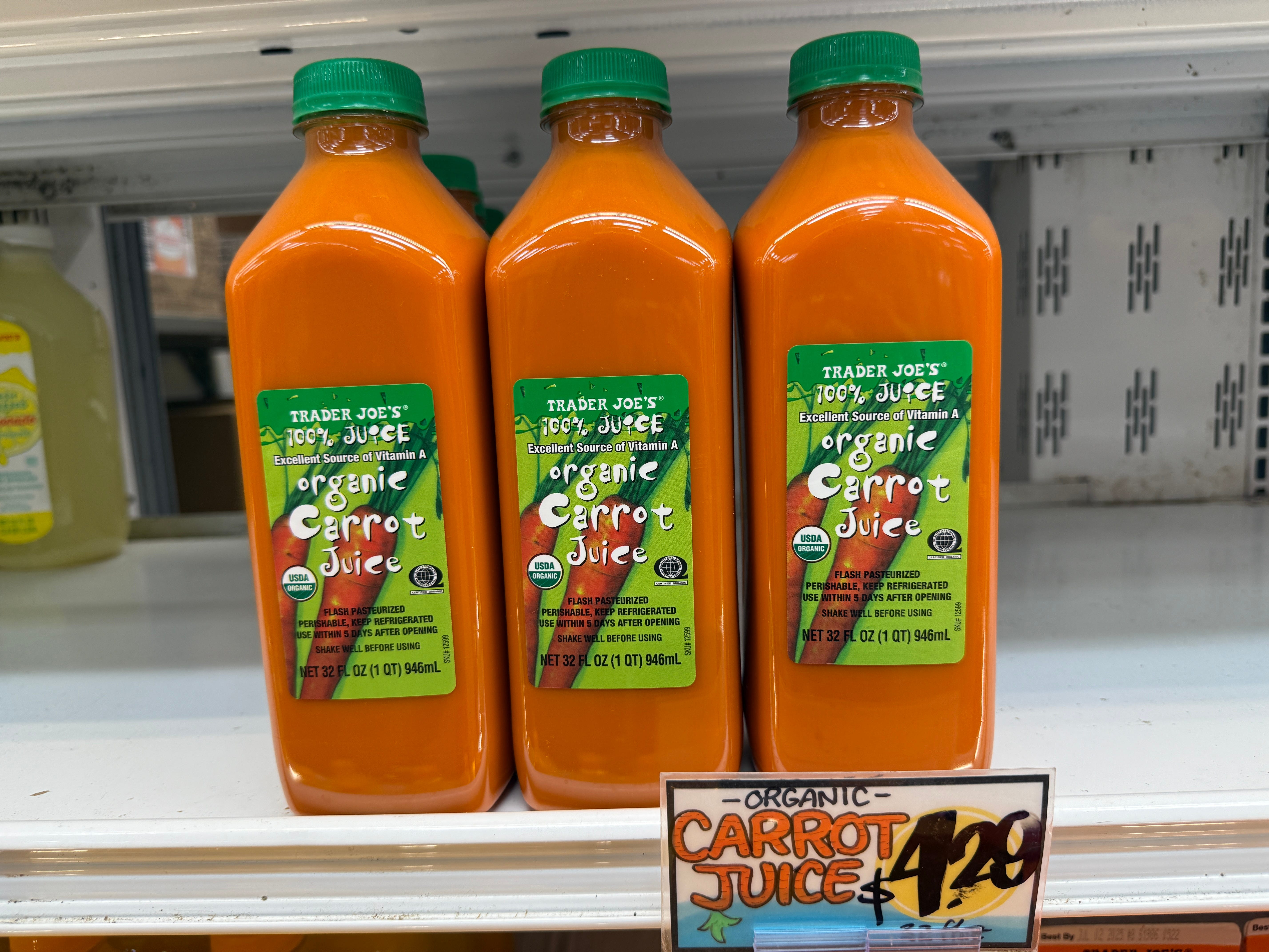 Bottles of organic carrot juice at Trader Joe's.
