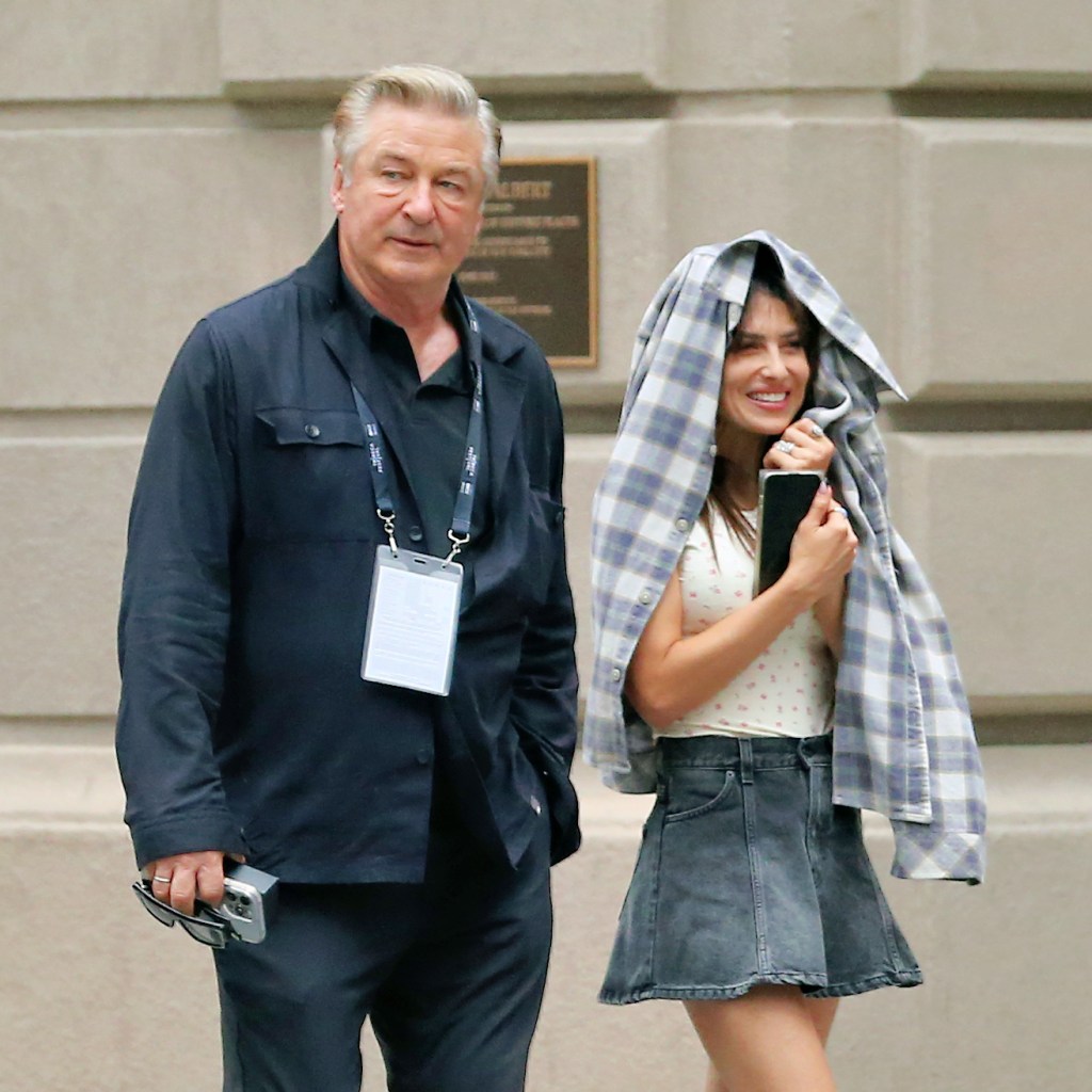 Alec and Hilaria Baldwin have a blue moment while on a rainy walk in Greenwich Village.