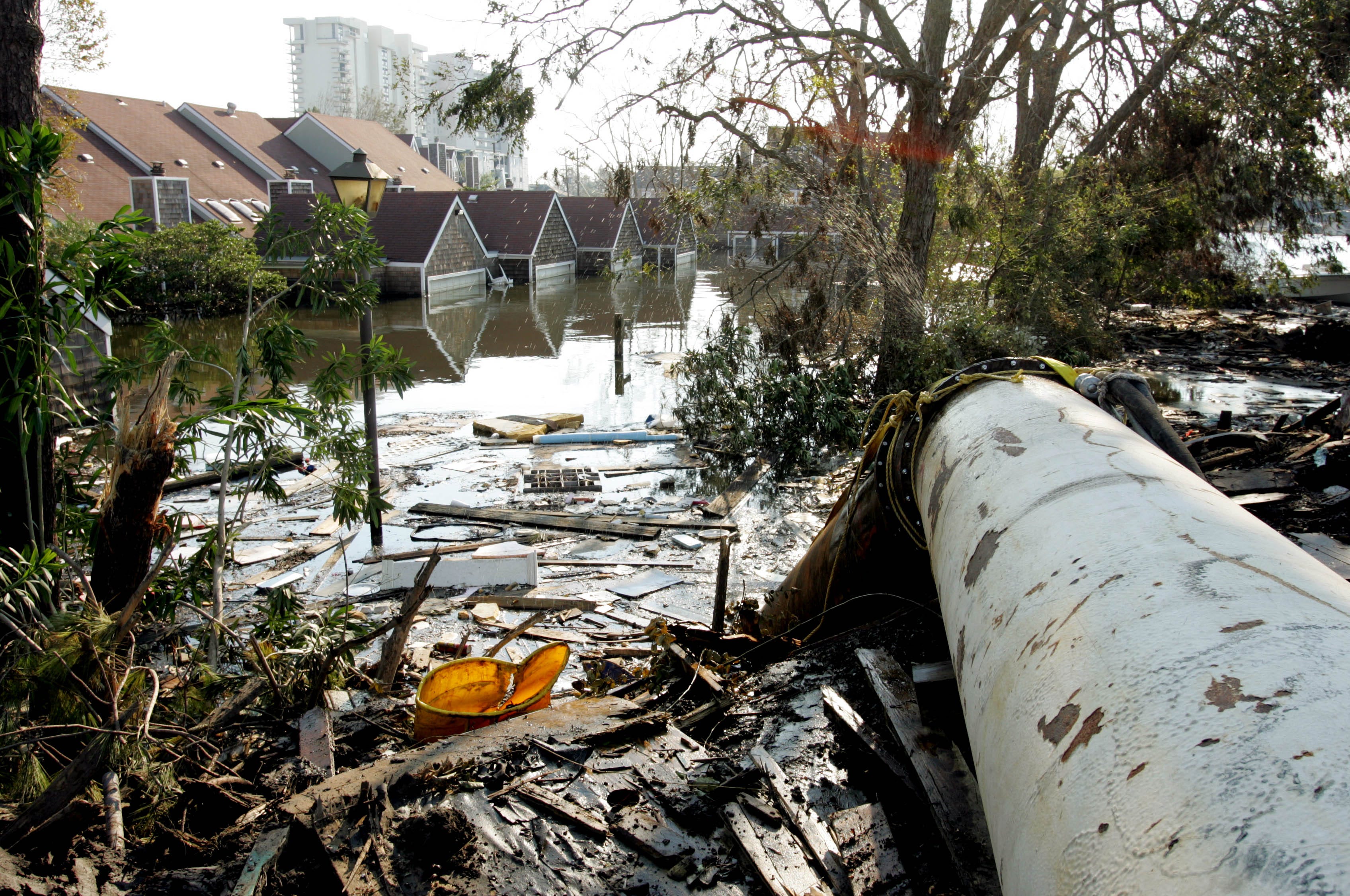 Water is pumped out of a flooded Metairie, Louisiana, after Hurricane Katrina