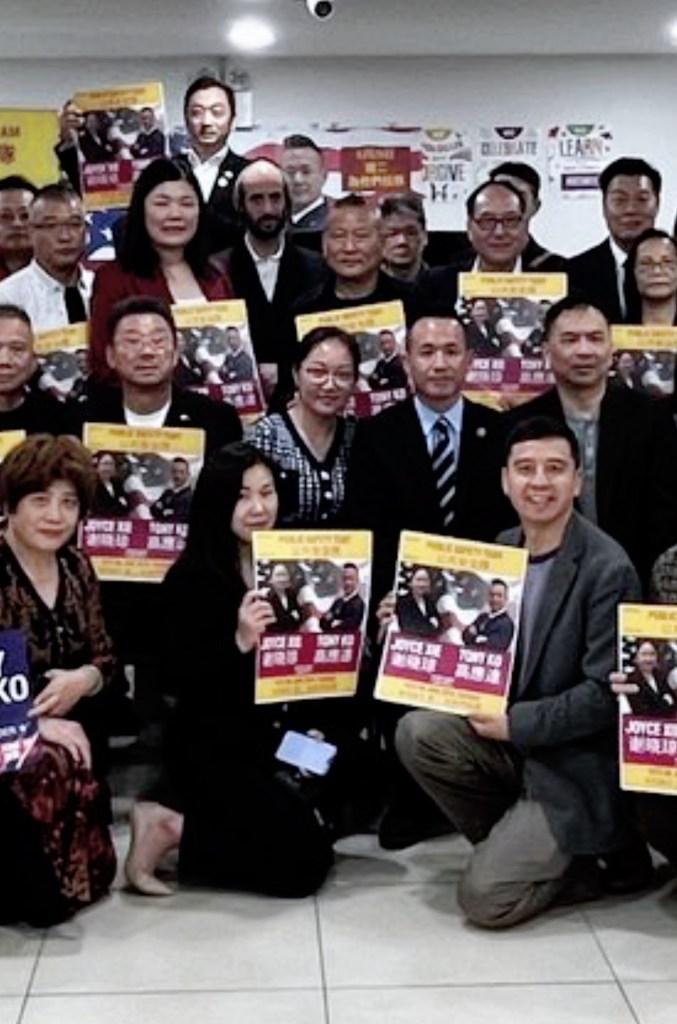 Shot of Larry He and John Chan at a rally for district leaders in the 49th AD. Councilwoman Susan Zhuang stands directly above Chan.