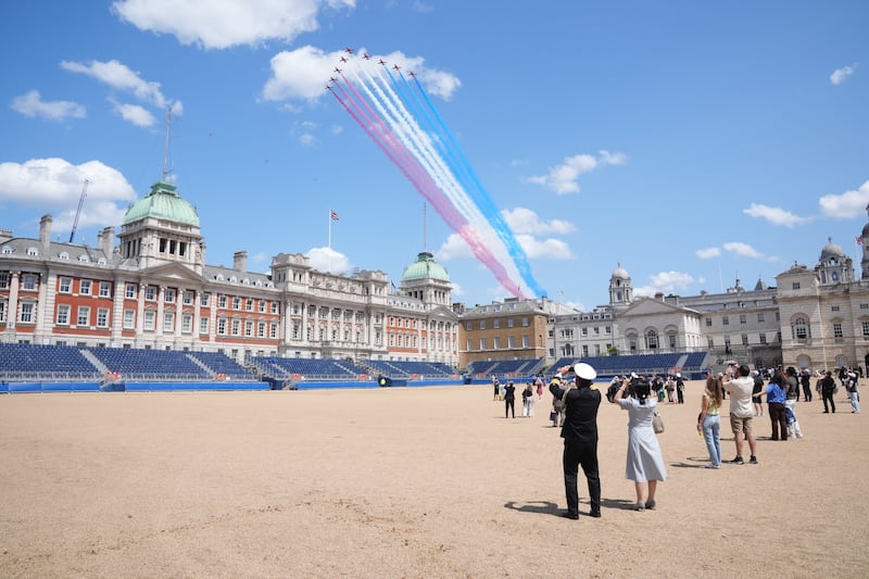 The Red Arrows take part in a flypast, seen from Horse Guards Parade, central London, following the Trooping the Colour ceremony in central London, in celebration of King Charles III's official birthday. Picture date: Saturday June 14, 2025. (Photo by Jonathan Brady/PA Images via Getty Images)