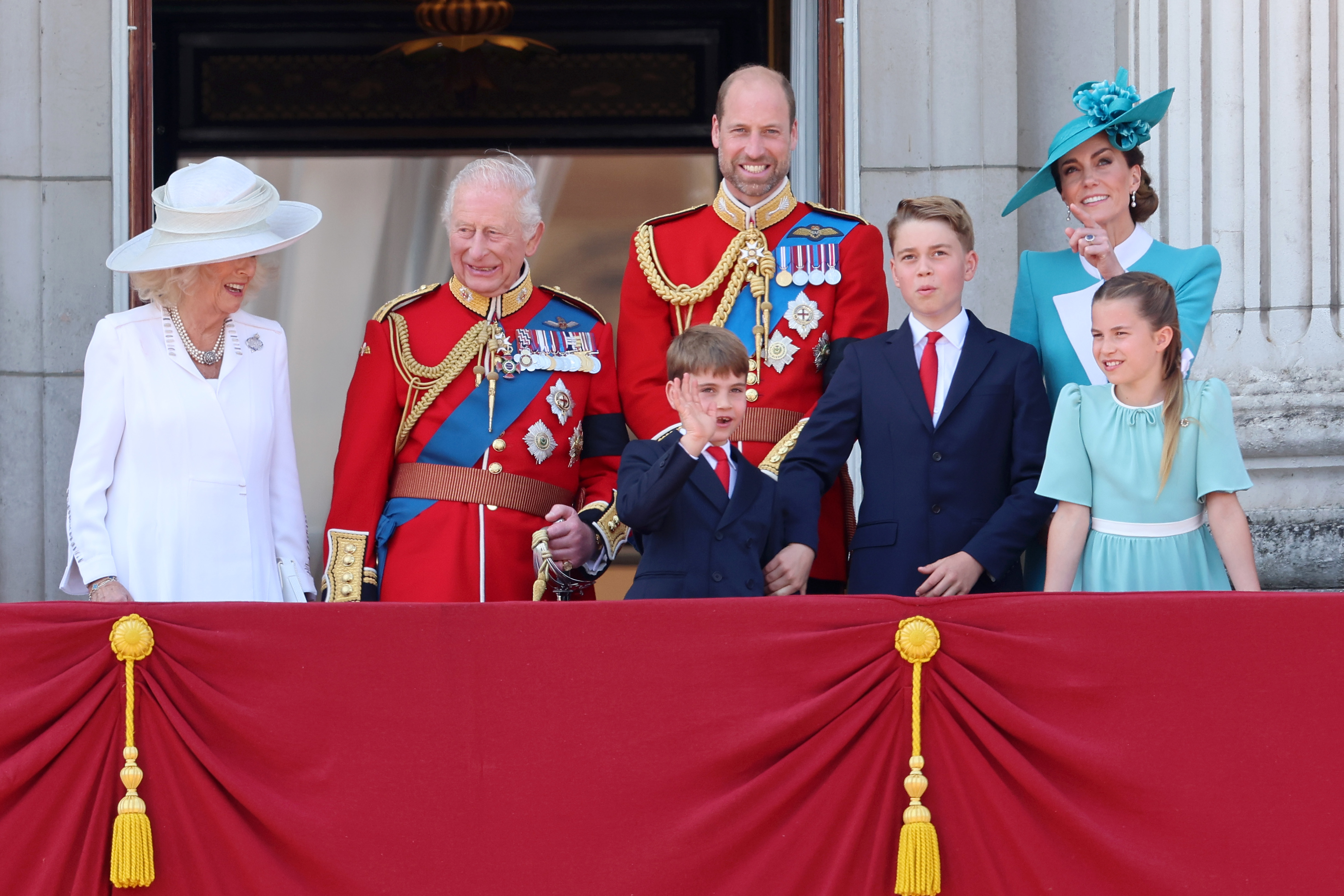 The royals posing in Buckingham Palace.