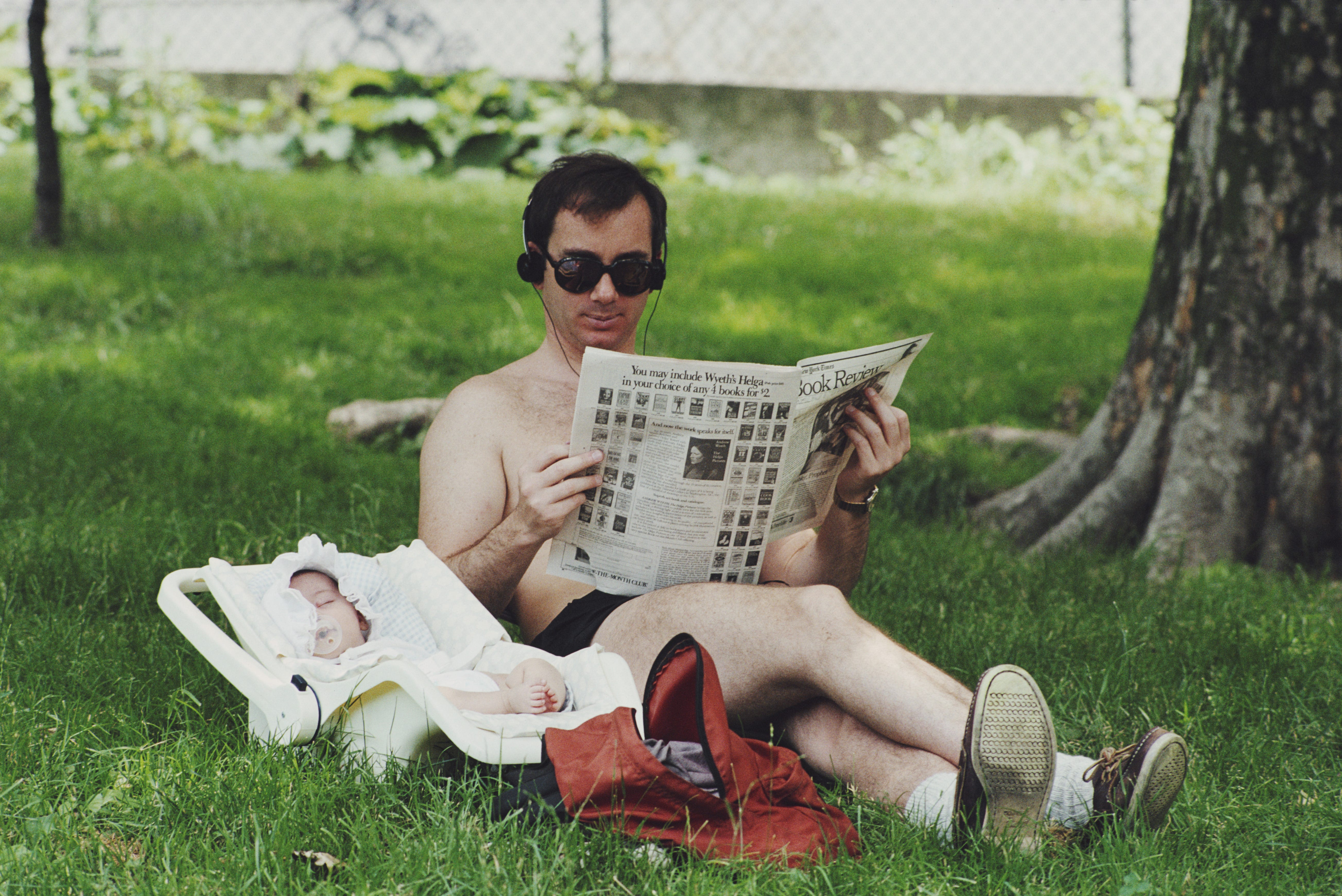 dad with baby at park, 1980s