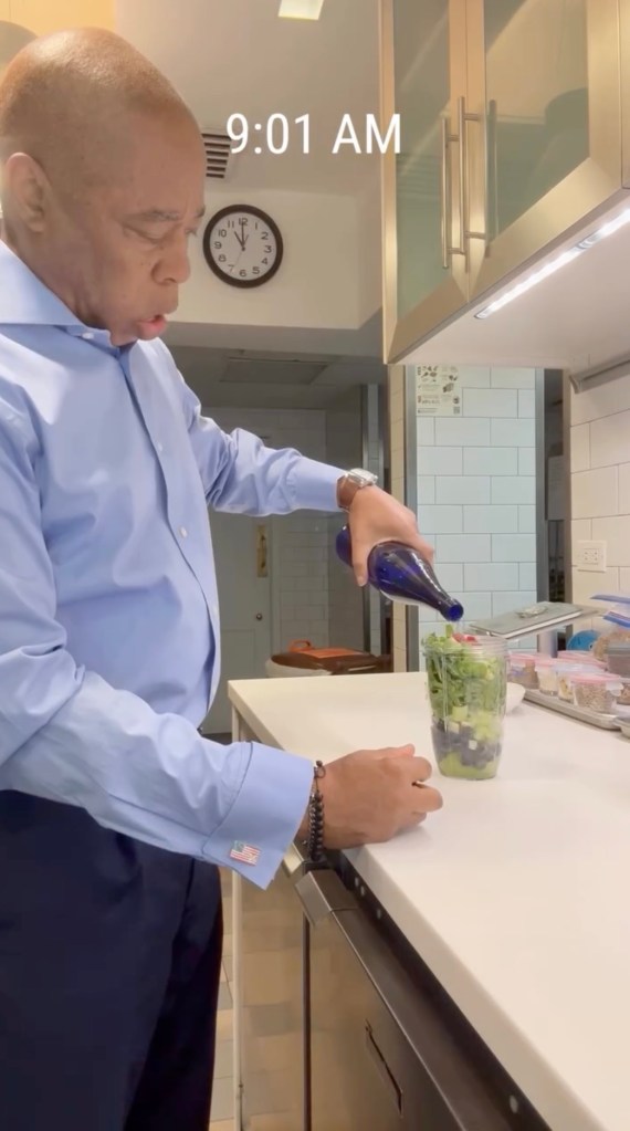 Mayor Eric Adams making a smoothie in his kitchen.