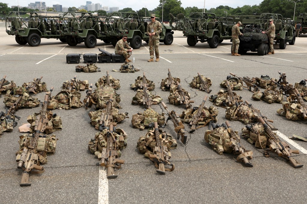 Soldiers' equipment laid out on the ground at the Pentagon ahead of a military parade.