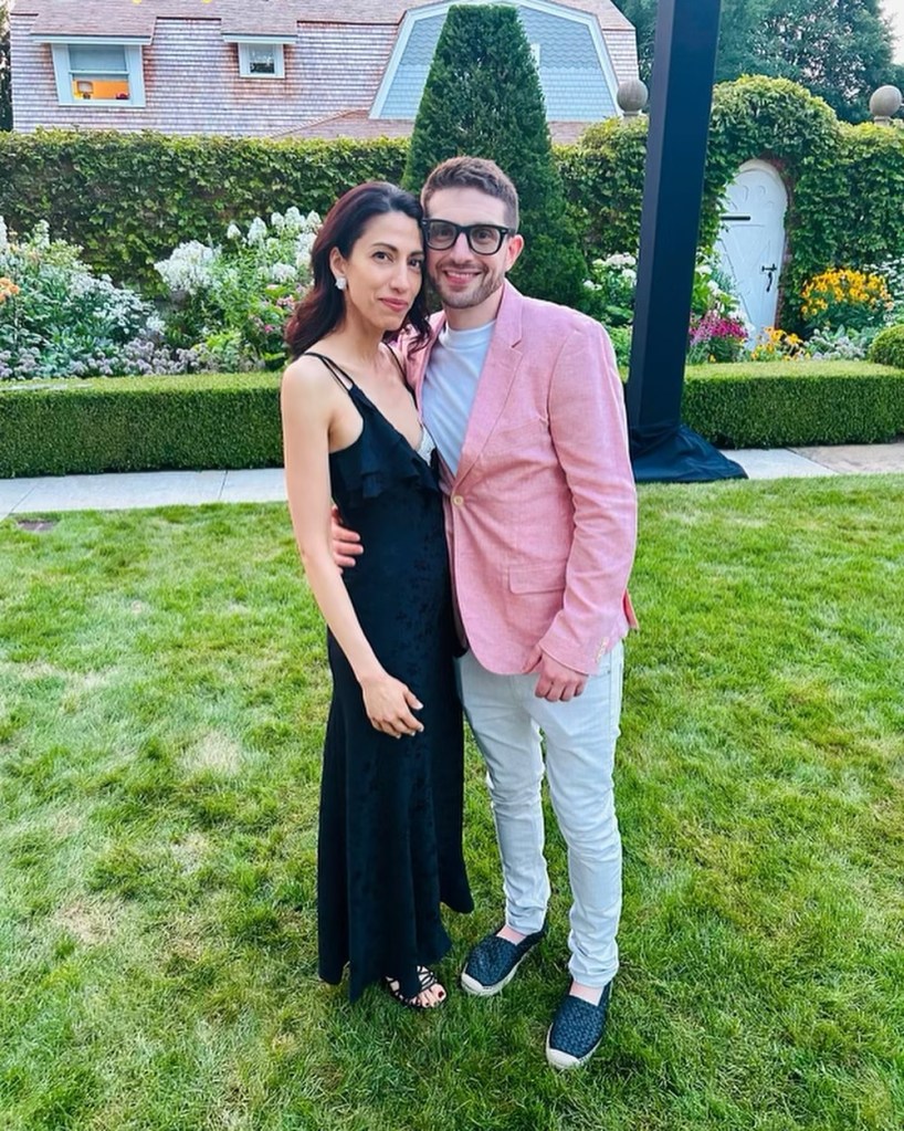 Huma Abedin and Alex Soros posing for a photo. 