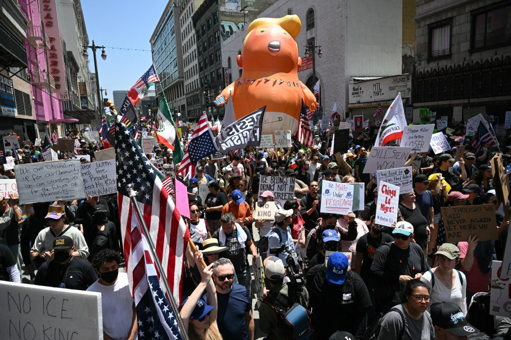 Protestors march in Los Angeles against President Trump.