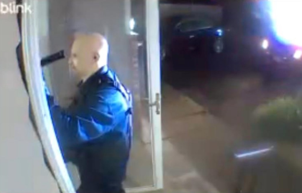 Surveillance image of Vance Boelter, person of interest in a shooting.