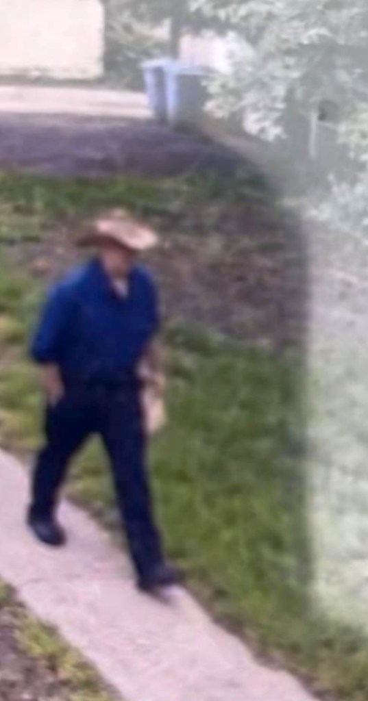 Surveillance image of Vance Boelter, person of interest in a shooting.