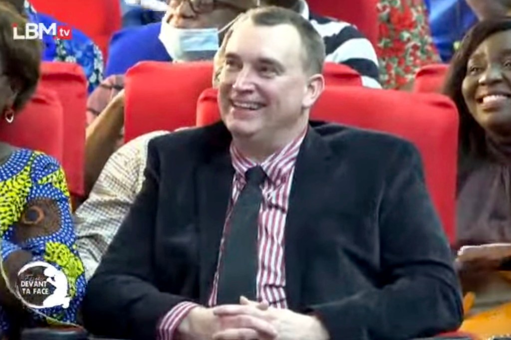 Vance Boelter, a person of interest in a Minnesota shooting, at a church in the Democratic Republic of Congo.