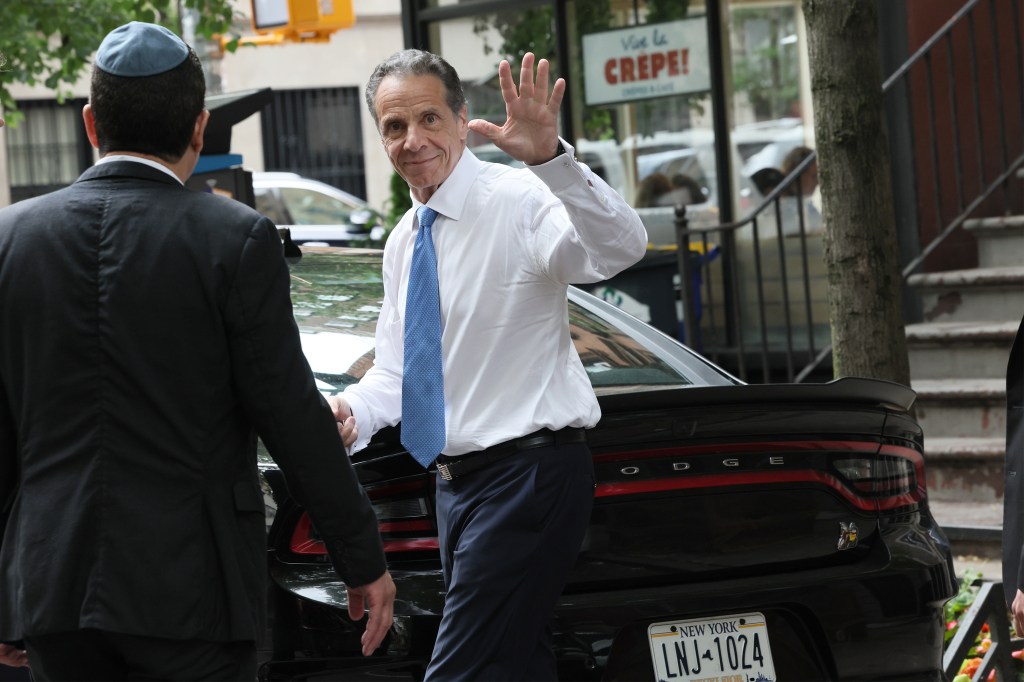 Andrew Cuomo waving goodbye.