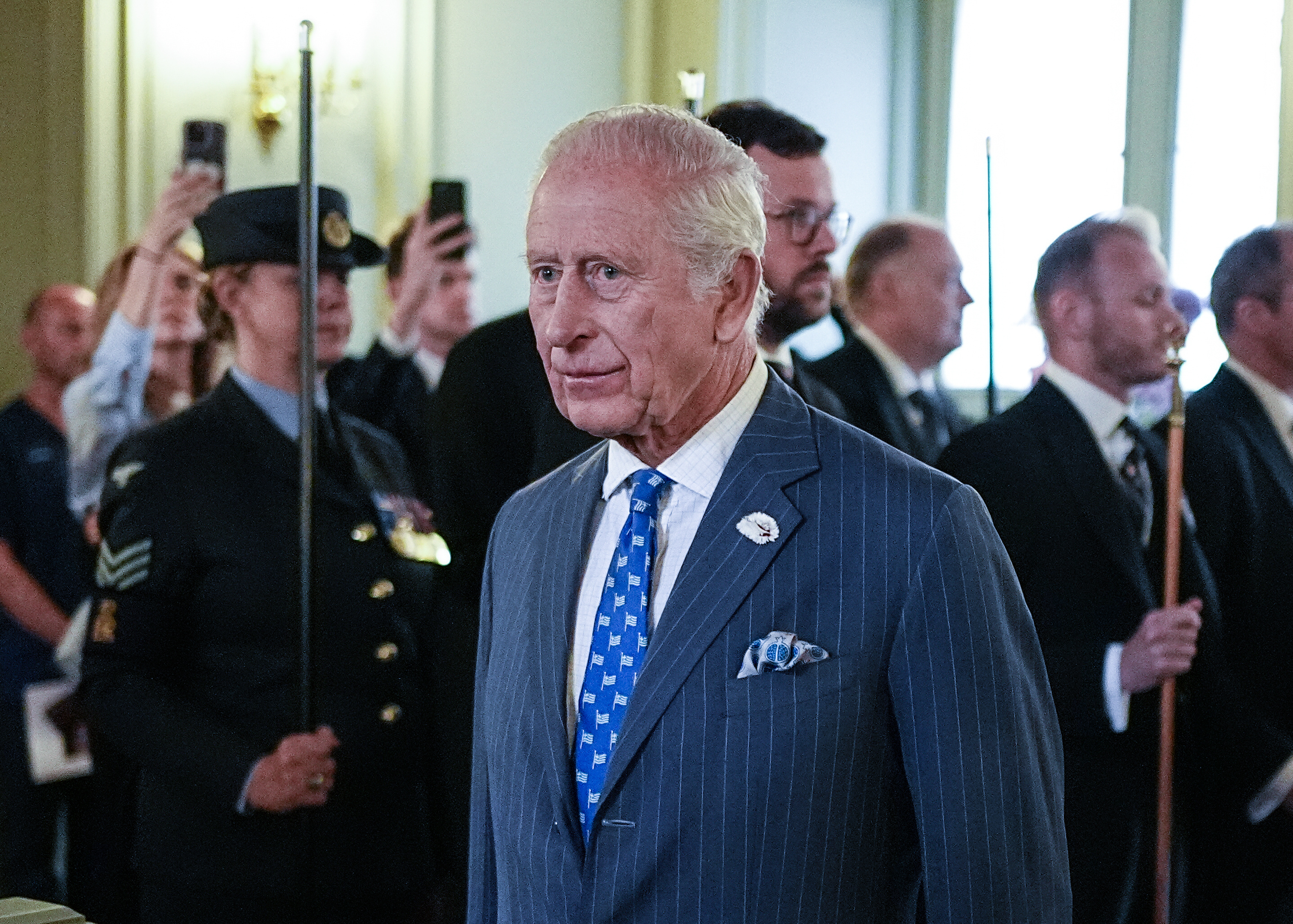 King Charles in a blue suit