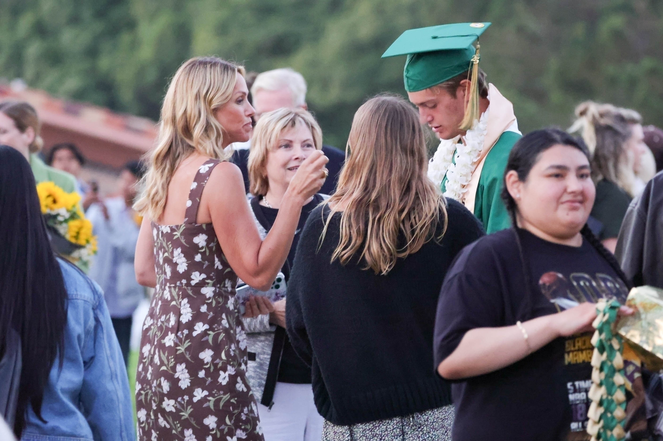 Christine Baumgartner and her kids at Cayden's graduation