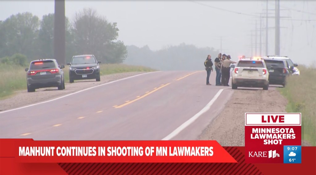 Law enforcement officers at roadside during manhunt following shooting of Minnesota lawmakers.