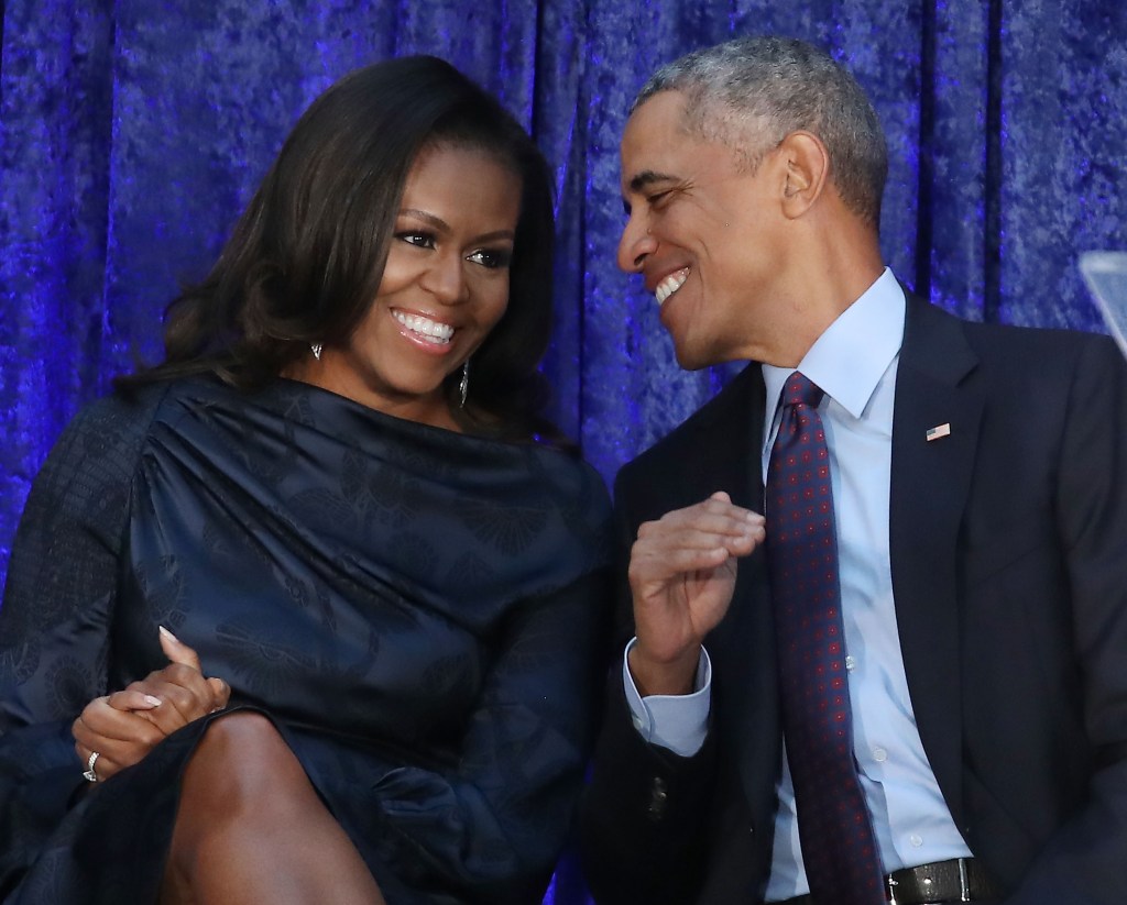 President Barack Obama and first lady Michelle Obama participate in the unveiling of their official portraits during a ceremony at the Smithsonian's National Portrait Gallery, on February 12, 2018 in Washington, DC. 