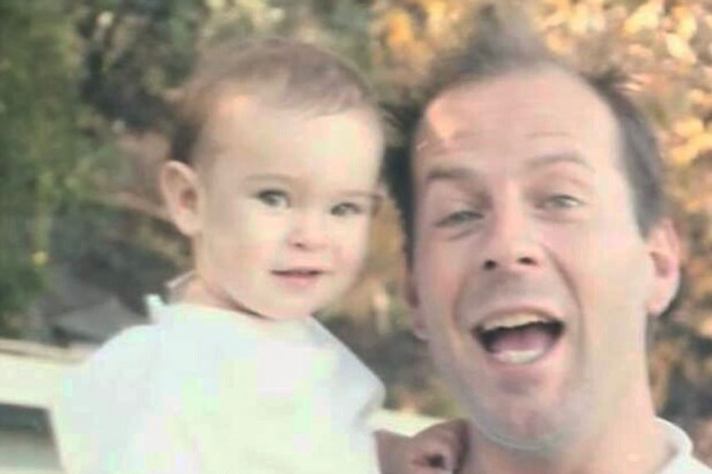 Rumer Willis poses with her father Bruce Willis as a child.
