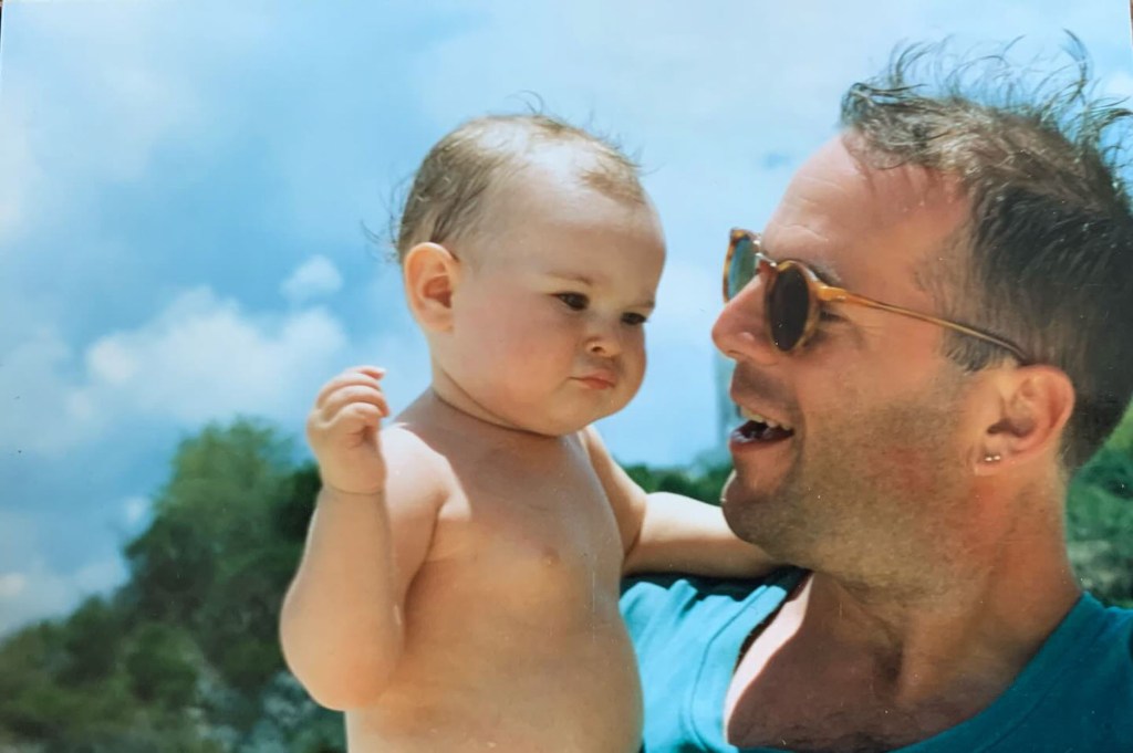 Rumer Willis poses with her father Bruce Willis as a child.