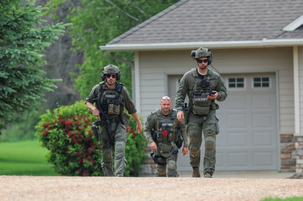 Law enfrocement officers searching for Boelter in Sibley County on June 15, 2025.