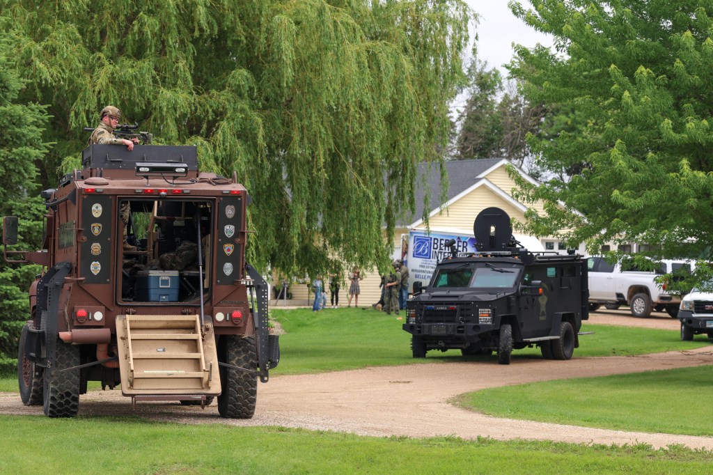 Law enforcement vehicles seen during the manhunt for Boelter.