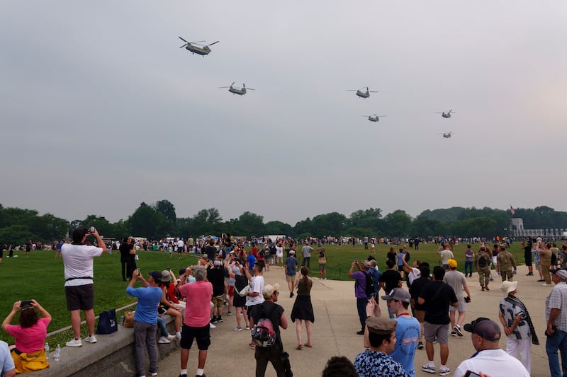 U.S. Army CH-47 Chinook helicopters fly across the National Mall during the 250th birthday parade on June 14, 2025 in Washington, DC. The U.S. Army is marking its 250th birthday with a military parade including roughly 6,600 troops, 150 vehicles, and over 50 aircraft. The parade, which coincides with President Donald Trump's 79th birthday, is designed to tell the history of the Army.