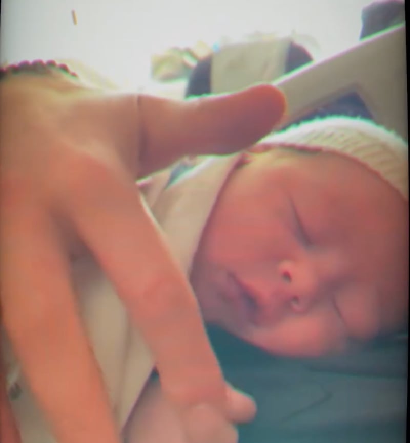 Prince Harry with baby