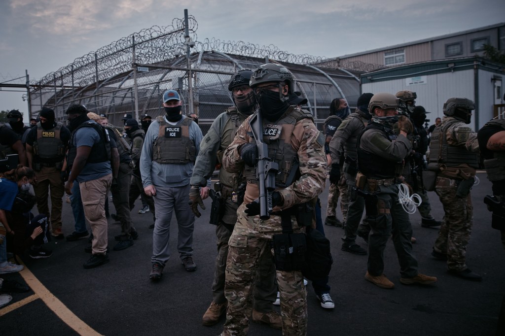 Protestors and law enforcement at an ICE detention facility in Newark, NJ.