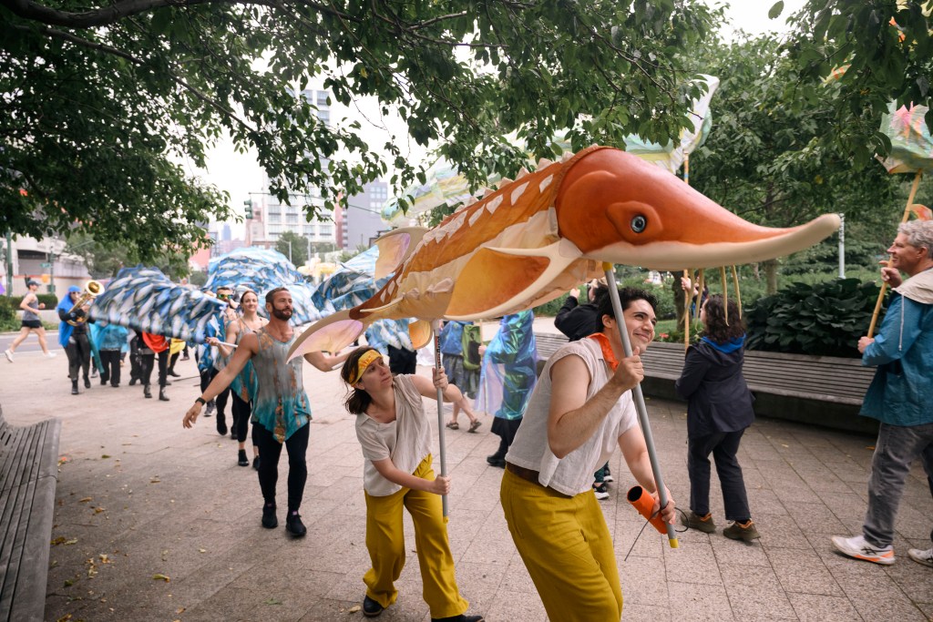 Marchers in the city’s first-ever Fish Migration Celebration in Chelsea on June 14, 2025.