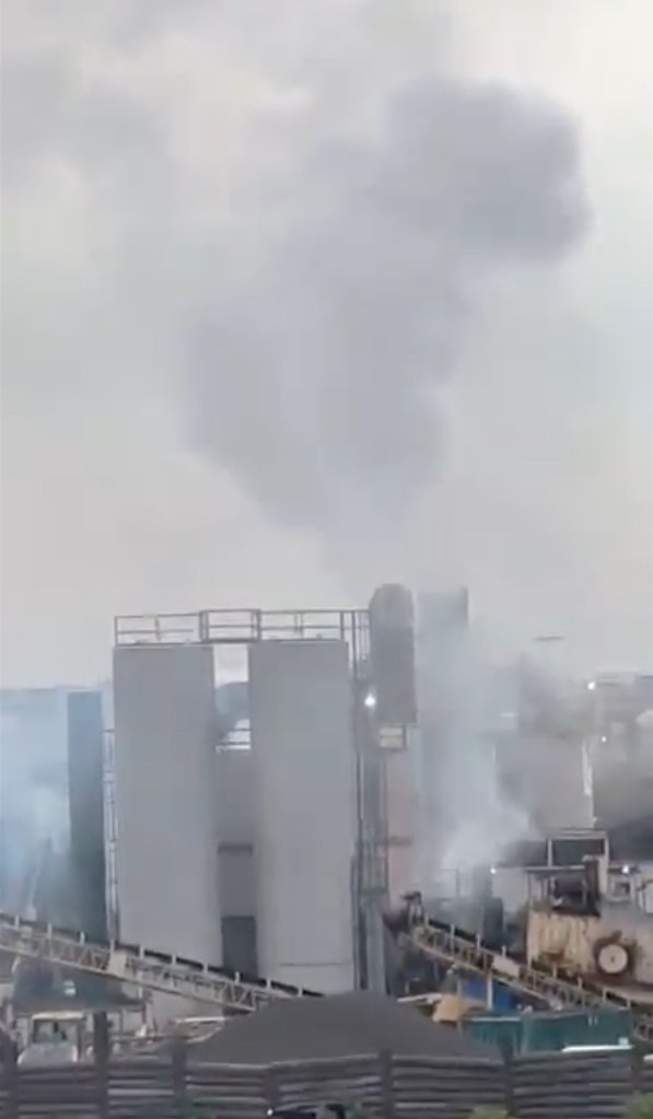 Smoke billowing from a recycling plant.