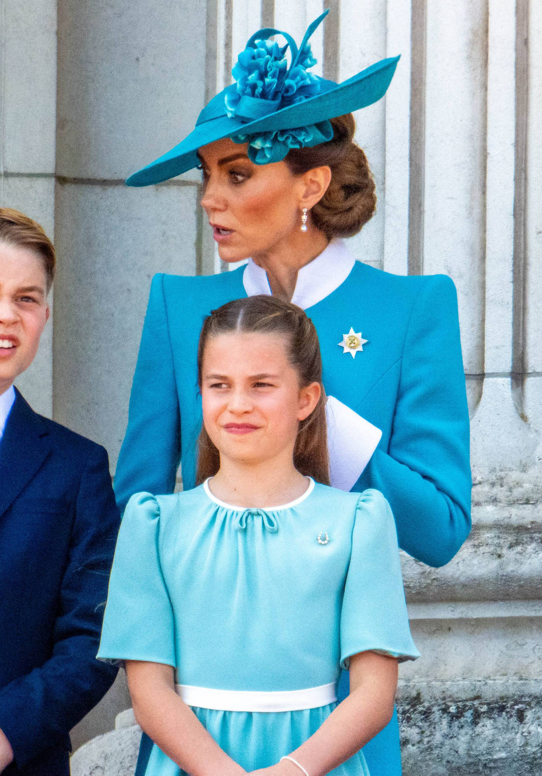 Kate Middleton and Princess Charlotte watch an RAF flypast from the balcony of Buckingham Palace in 2025